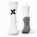 Chaussettes antidérapantes EXTÉR blanches, vue de profil et dessous avec picots