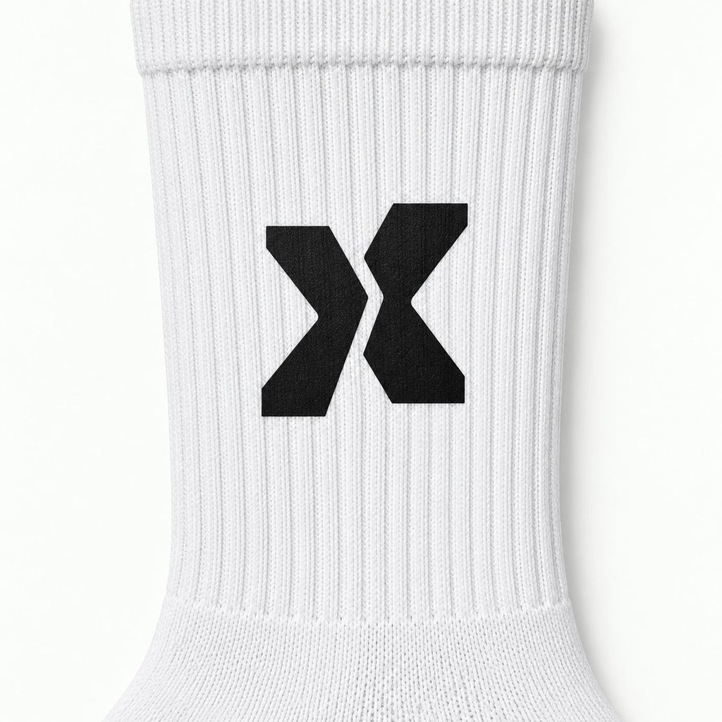 Détail de la chaussette junior et du symbole X EXTÉR